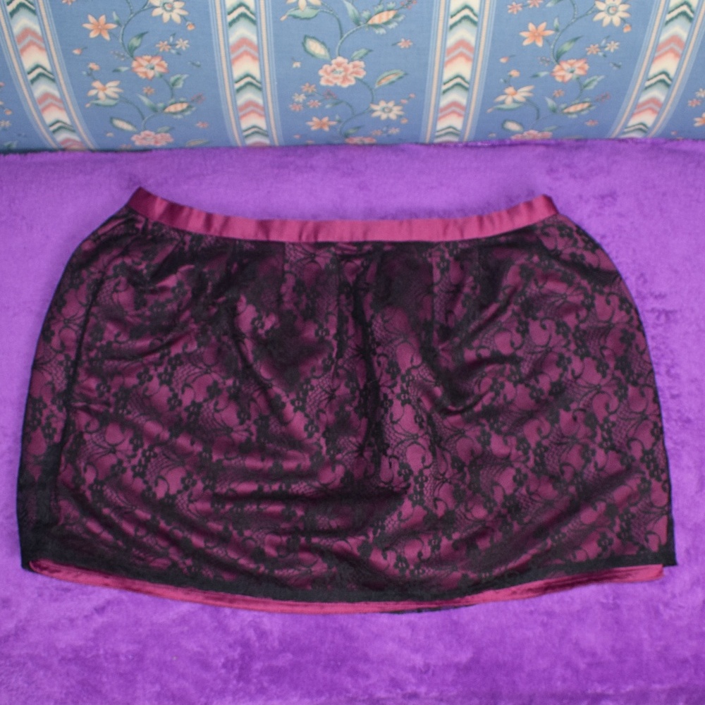 Maroon short lace covered skirt